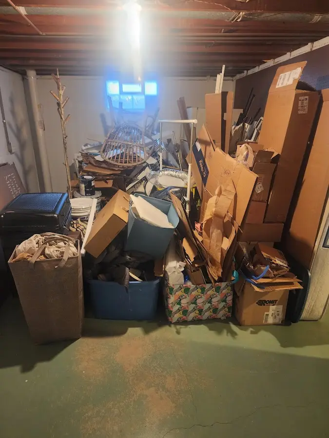 Roll-off dumpster container at job site for 2 Yard Dumpster Rental in North Bend